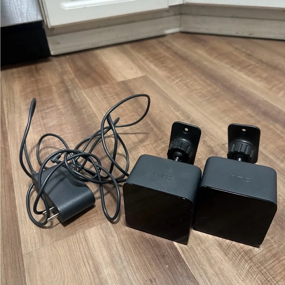 HTC VR Headset with Black Controllers and Sensors
